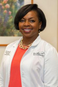 photo of tanya osborne-mckenzie wearing a lab coat