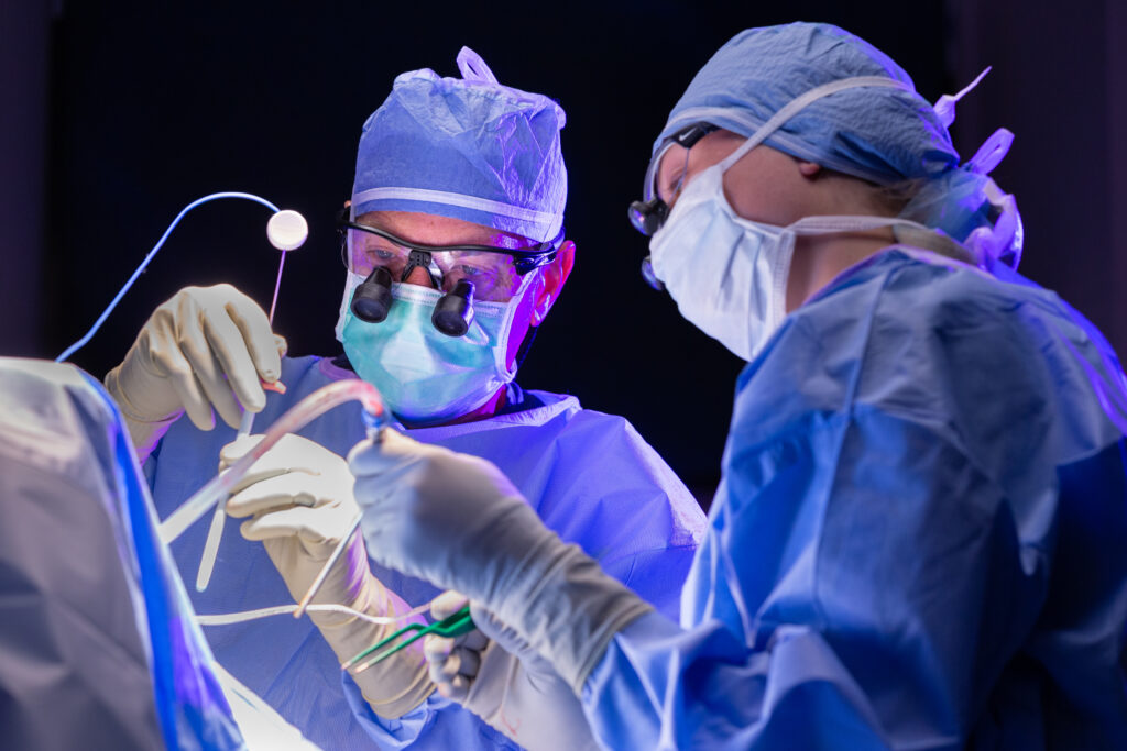 kris smith performing neurosurgery