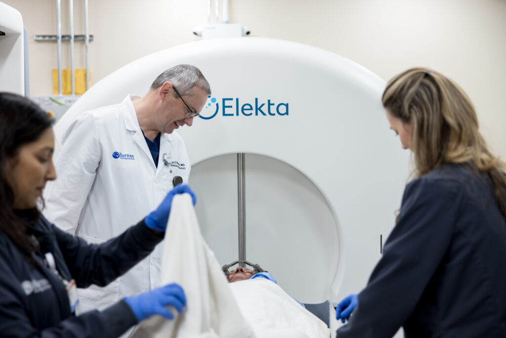 radiation oncologist igor barani counsels a patient before gamma knife treatment