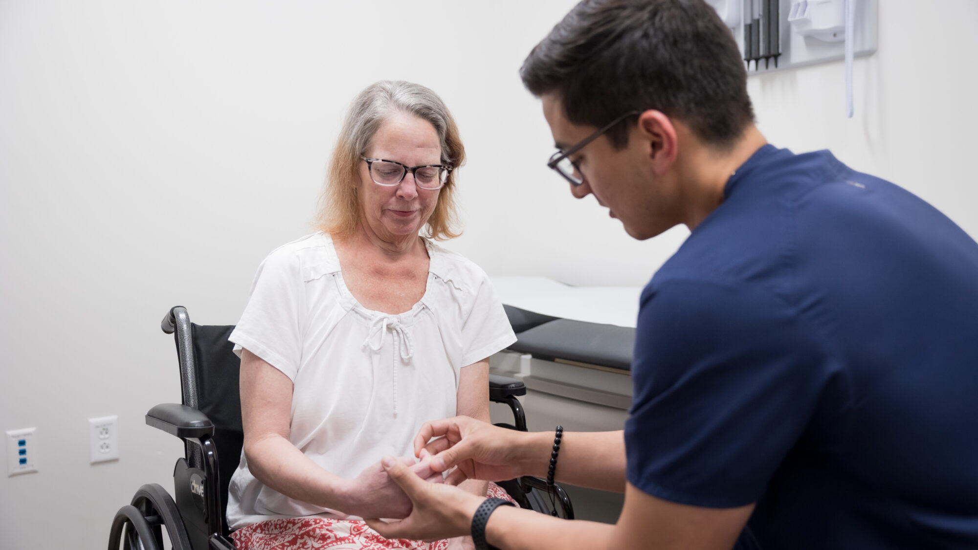 vascular neurologist daniel gonzalez examines a patient in the petznick stroke center in phoenix, arizona.