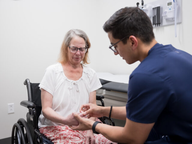 vascular neurologist daniel gonzalez examines a patient in the petznick stroke center in phoenix, arizona.