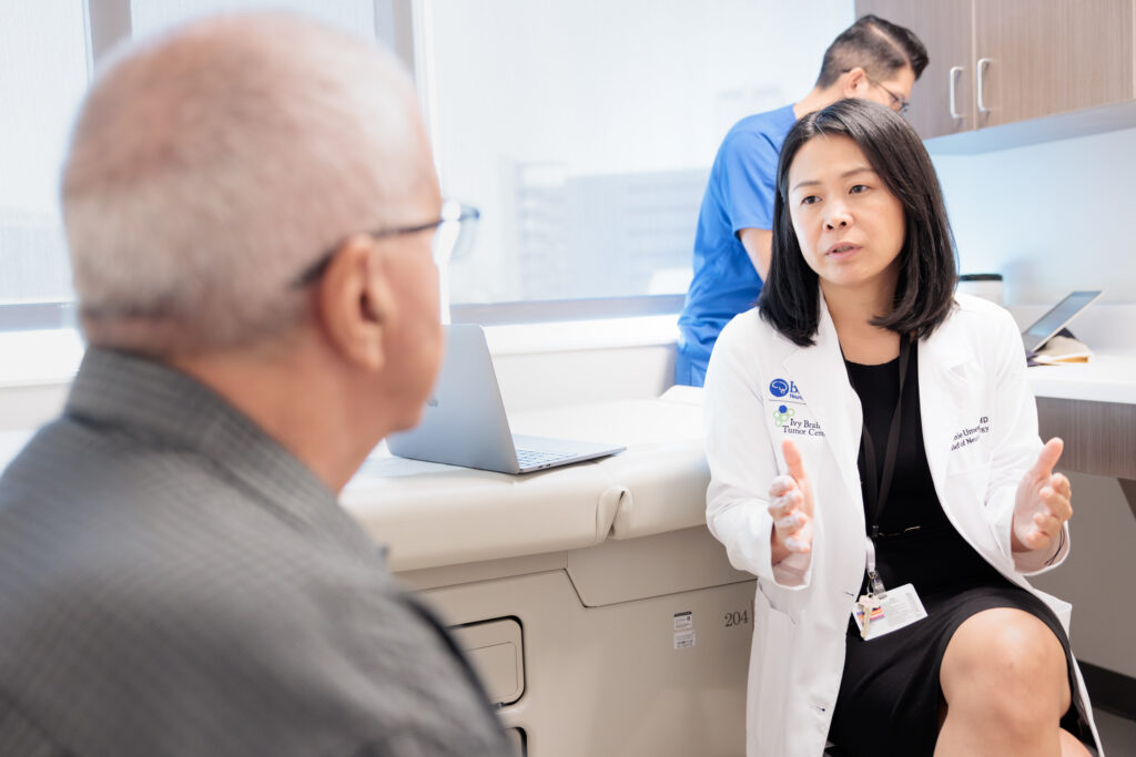 neuro-oncologist yoshie umemura counsels a brain tumor patient