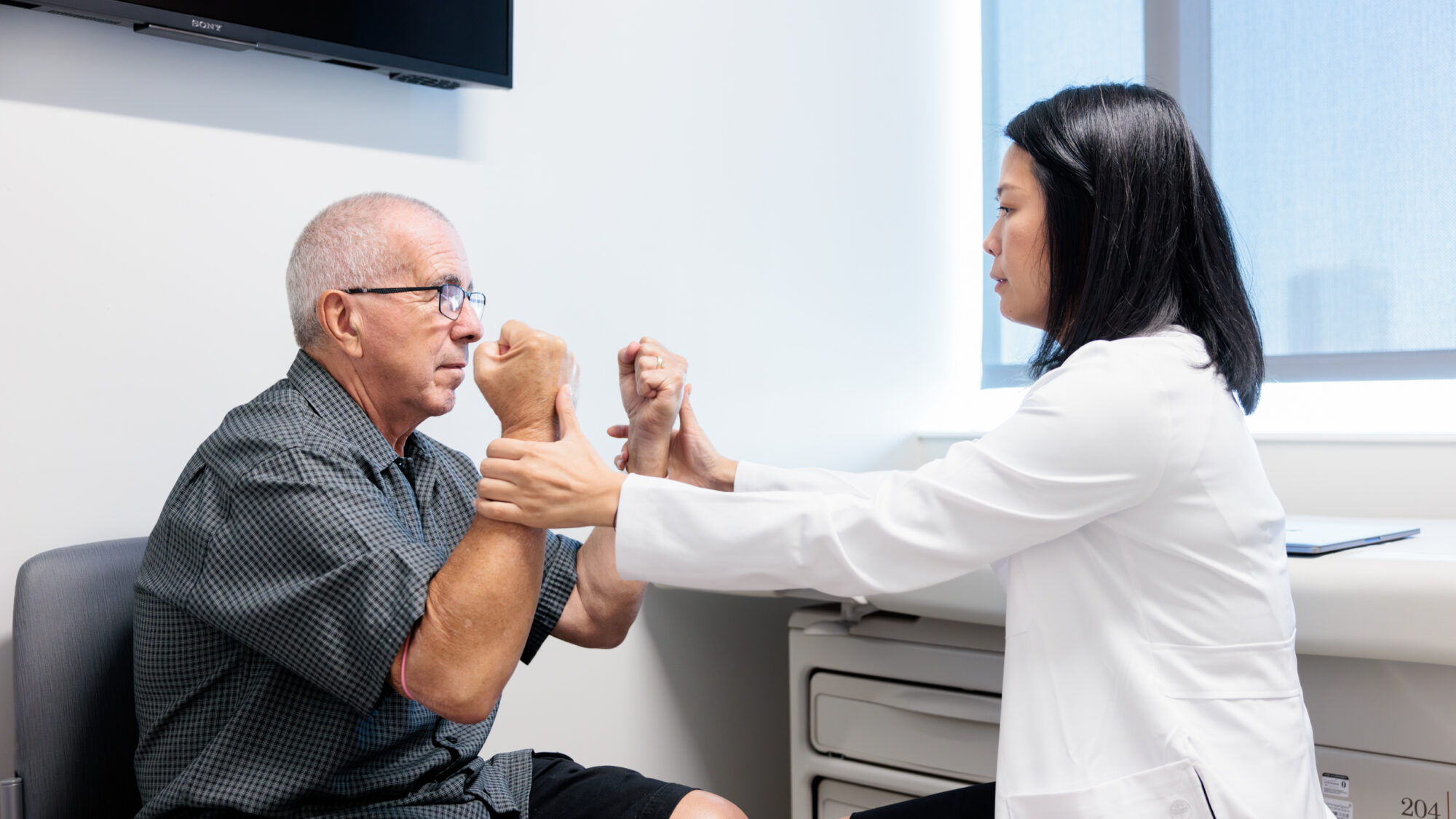 neuro-oncologist yoshie umemura counsels a brain tumor patient