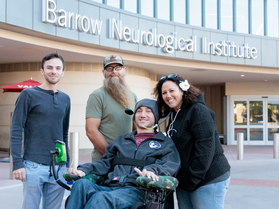 Noland Arbaugh with his family in front of the Neuroplex at Barrow Neurological Institute
