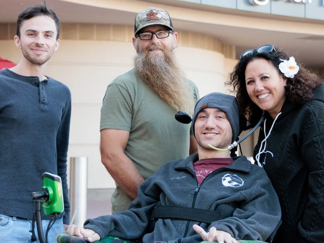 Neuralink and Barrow Neurological Institute First Human Trial in Phoenix, AZ. Noland and his family pose outside of the Barrow Neuroplex.