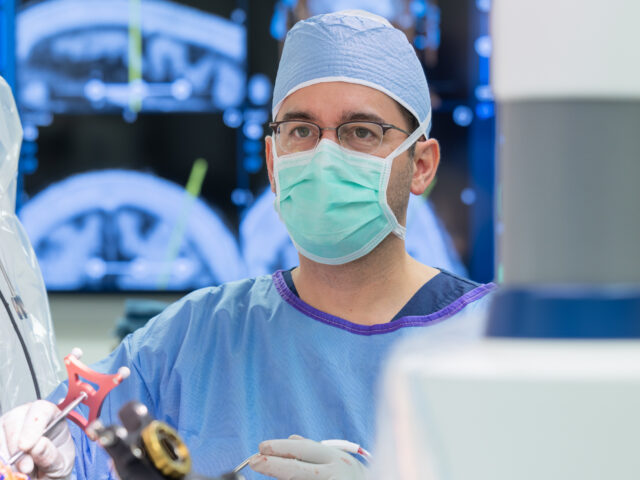 neurosurgeon francisco ponce in the operating room performing dbs surgery