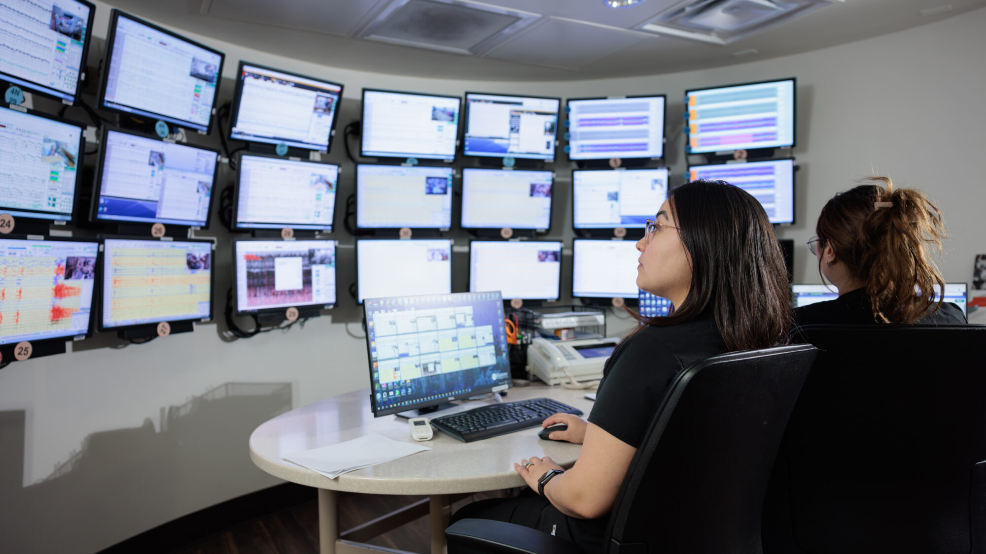 eeg technologists look at screens in the epilepsy monitoring unit at barrow neurological institute