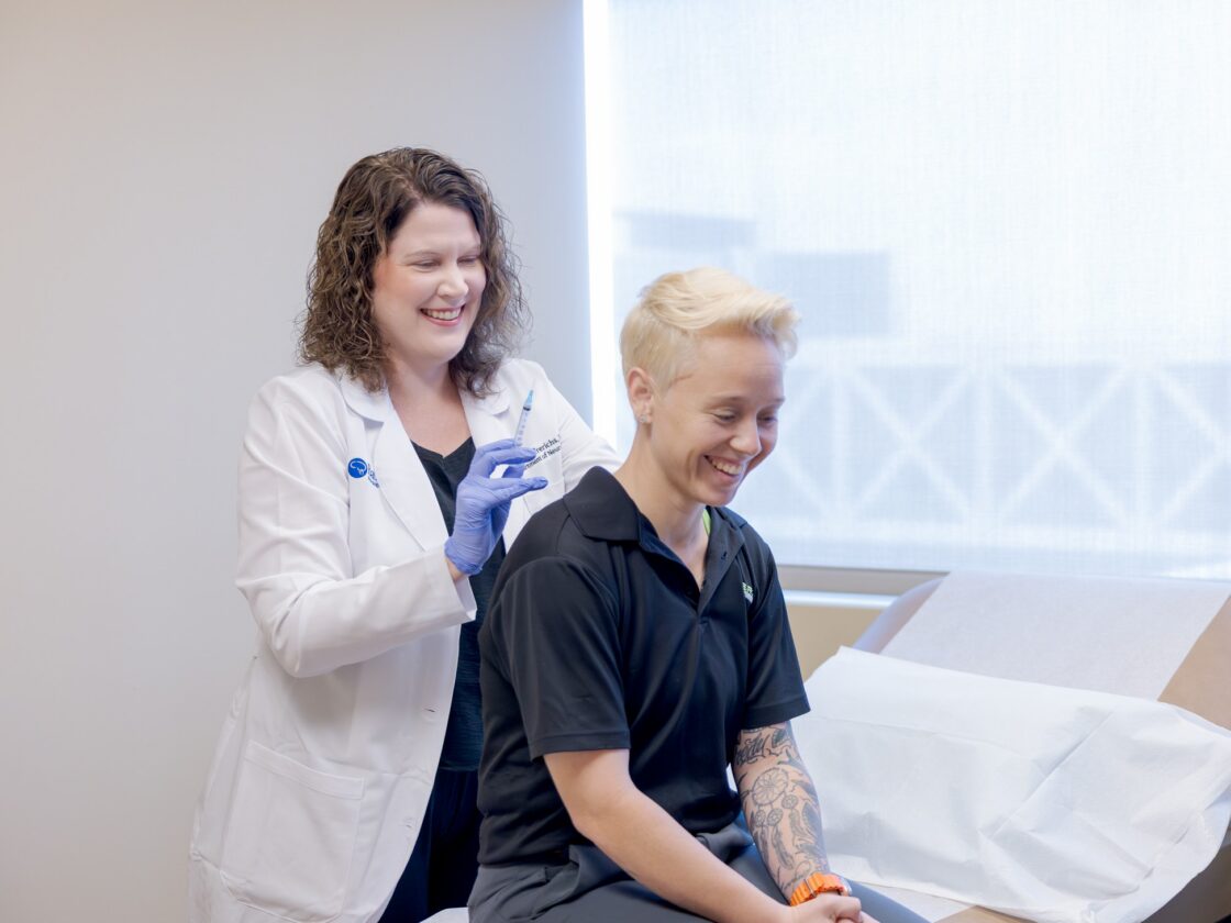 Dr. Frerichs with a patient.