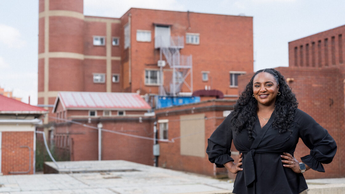 Dr. Huiam Mubarak poses in Johannesburg, South Africa for Barrow Global Travel Documentary.