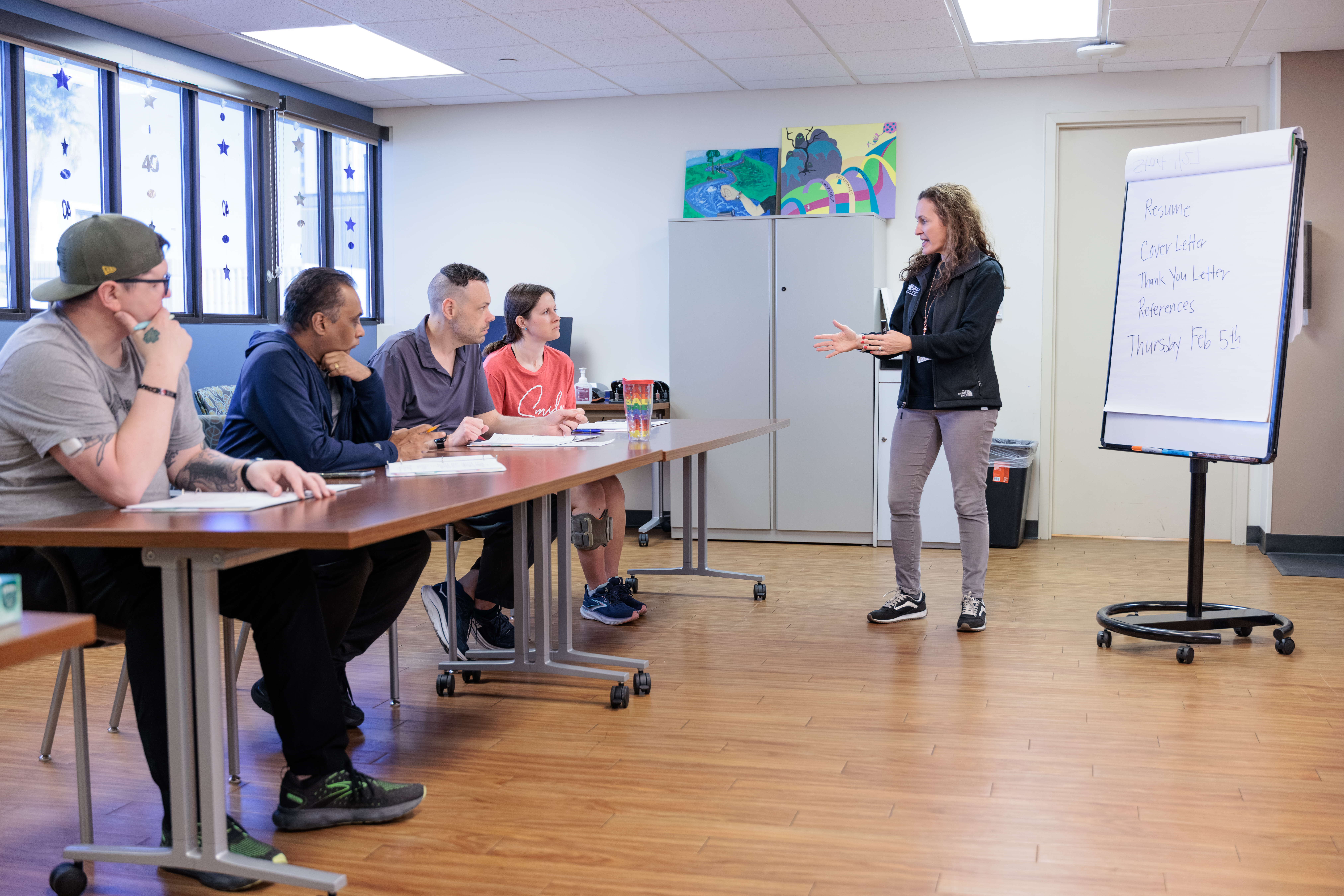 Patients of the Center for Transitional Neuro-Rehab learn about the job recruiting process.