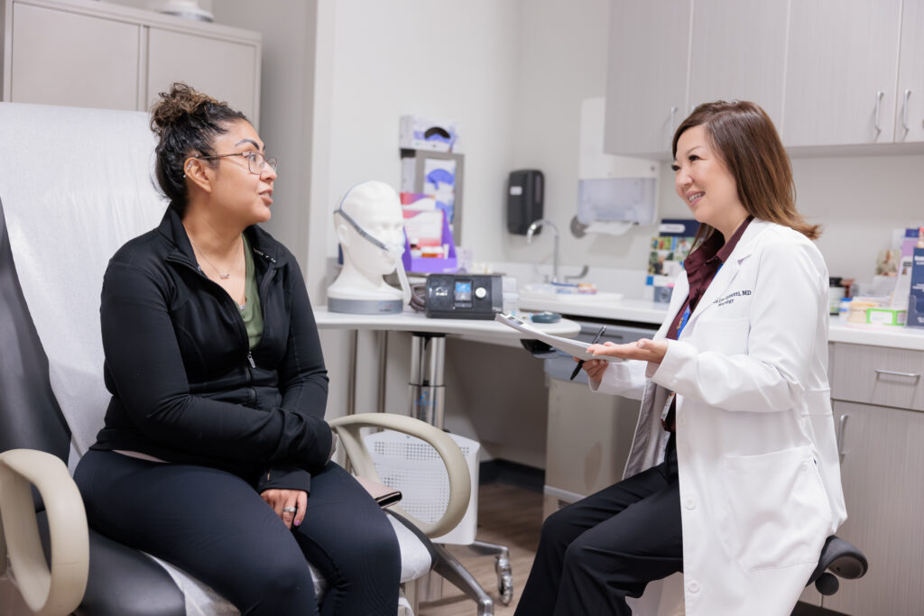 Dr. Lee-Ianotti with a patient.