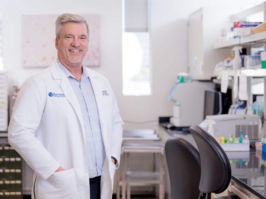 robert bowser standing in laboratory at barrow neurological institute.