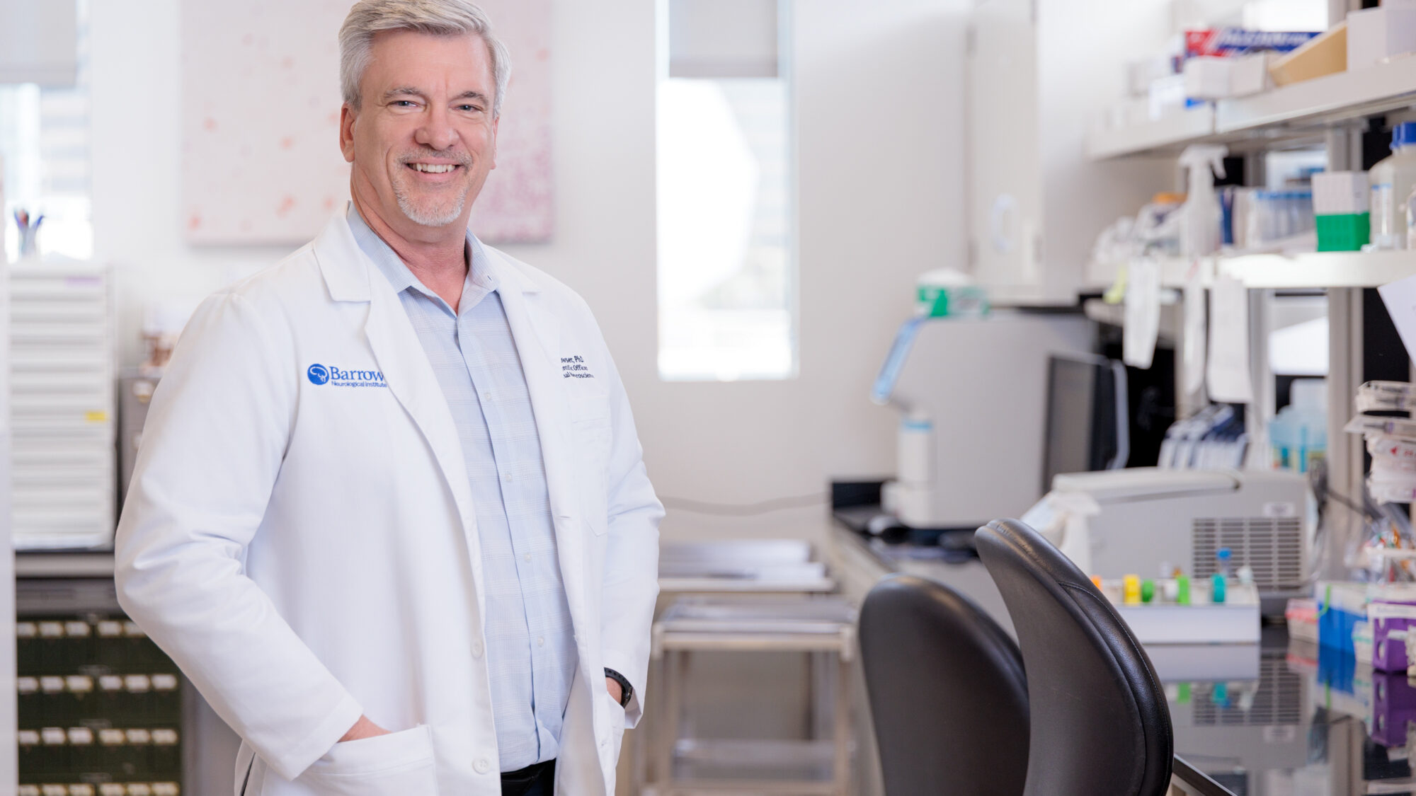 robert bowser standing in laboratory at barrow neurological institute.