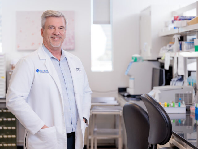 robert bowser standing in laboratory at barrow neurological institute.