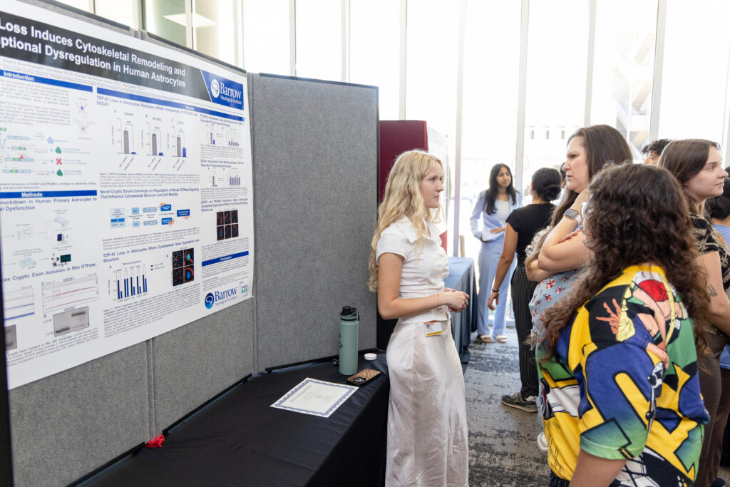 Student presenting poster at High School Internship Symposium
