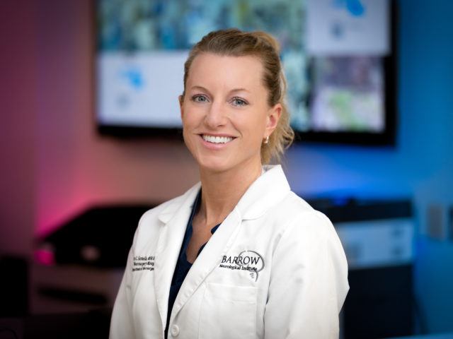 Portrait of Lynn Santella in the operating room
