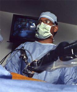 Dr. Curtis Dickman performing spine surgery in 1996.