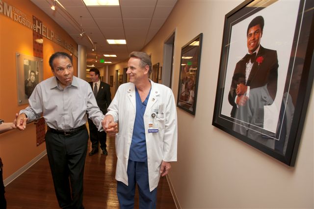 muhammad ali and dr. spetzler walking through parkinson's center