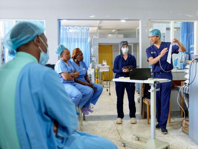 Dr. Patrick Crooks provides education at Kilimanjaro Christian Medical Centre in Tanzania