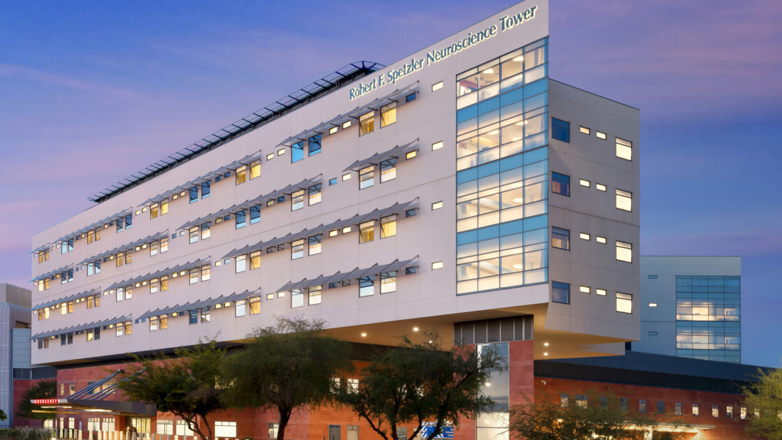 night photograph of the robert f. spetzler neuroscience tower