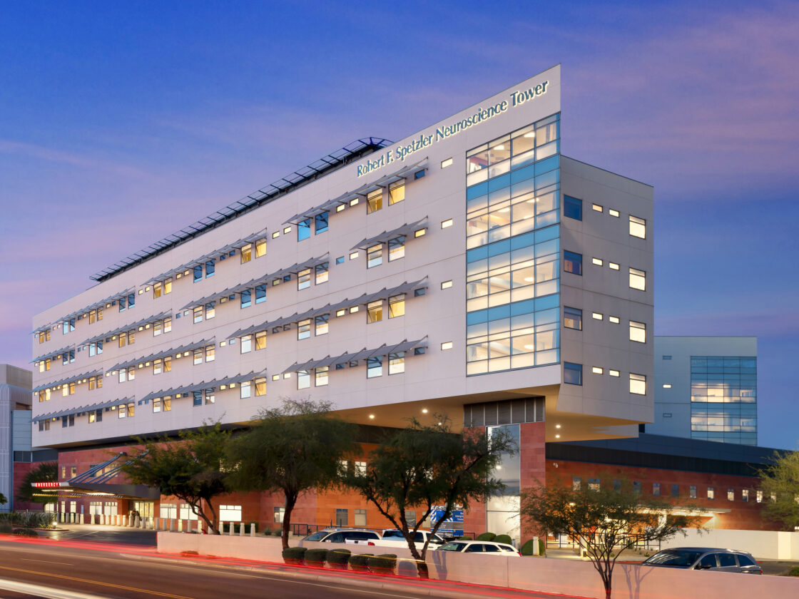 night photograph of the robert f. spetzler neuroscience tower