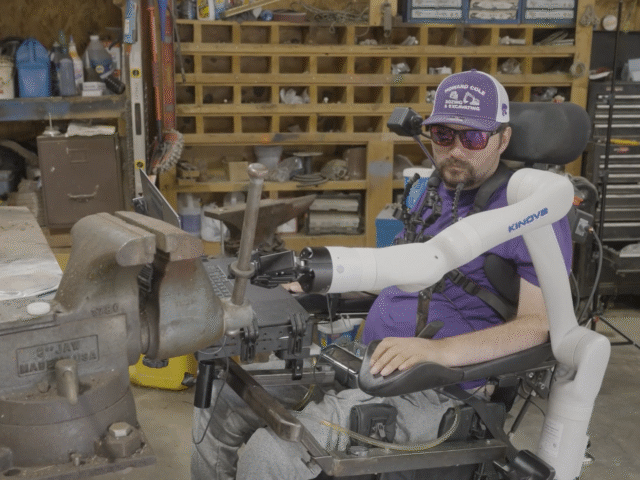Alex Conley, a Neuralink patient, controlling his robotic arm