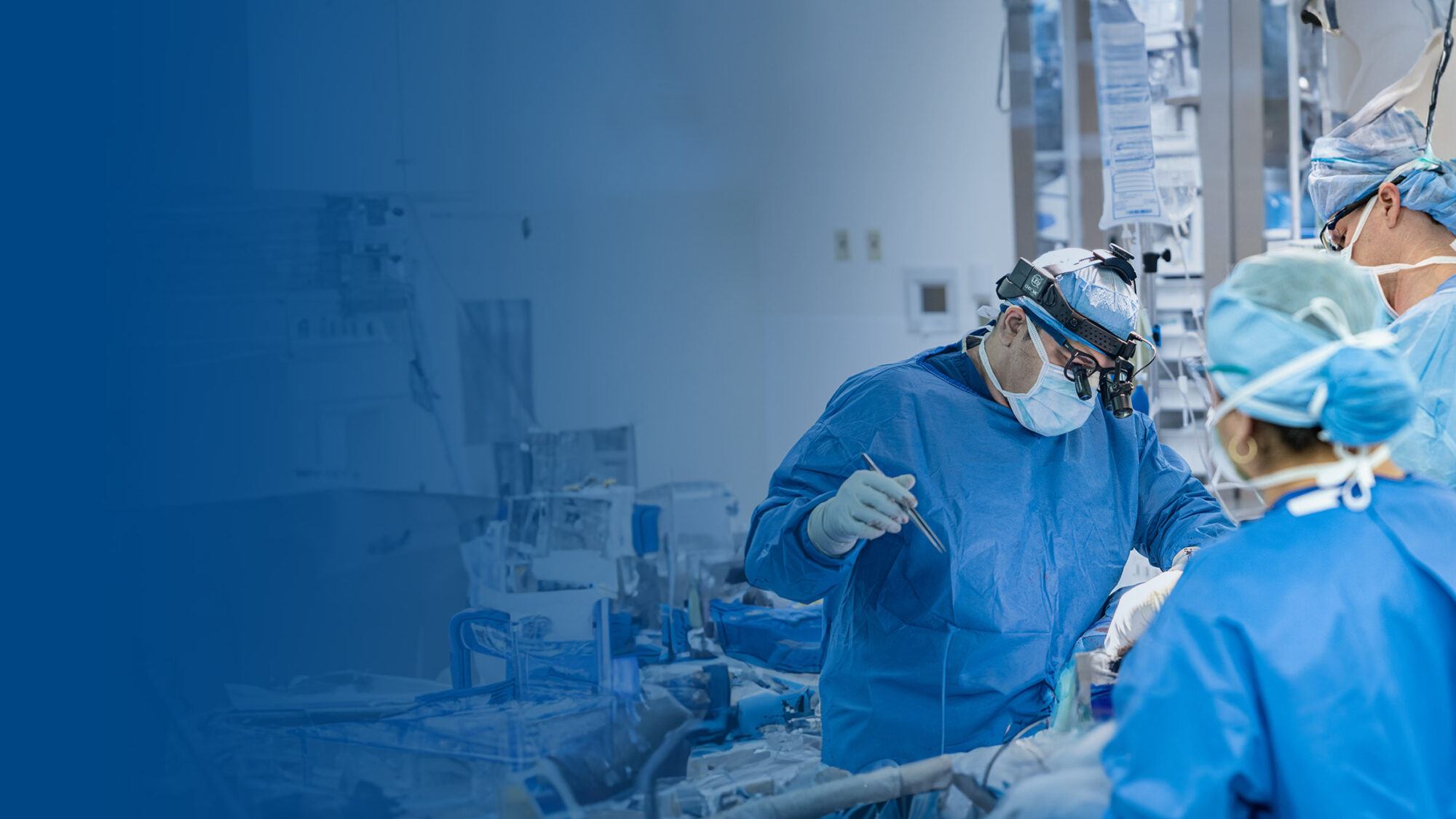 photo of head and neck surgeon ameya jategaonkar performing head and neck cancer surgery in an operating room at barrow neurological institute in phoenix arizona