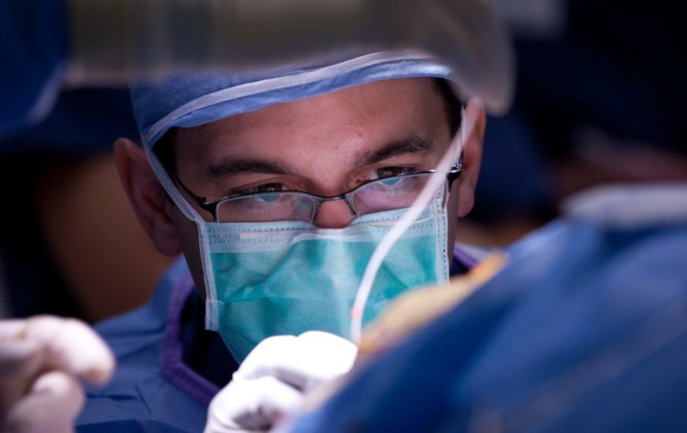 Dr. Ponce working in the operating room