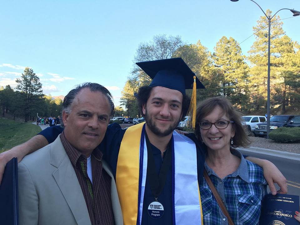 Patient Anthony Veglia graduating after recieving treatment for an aneurysm
