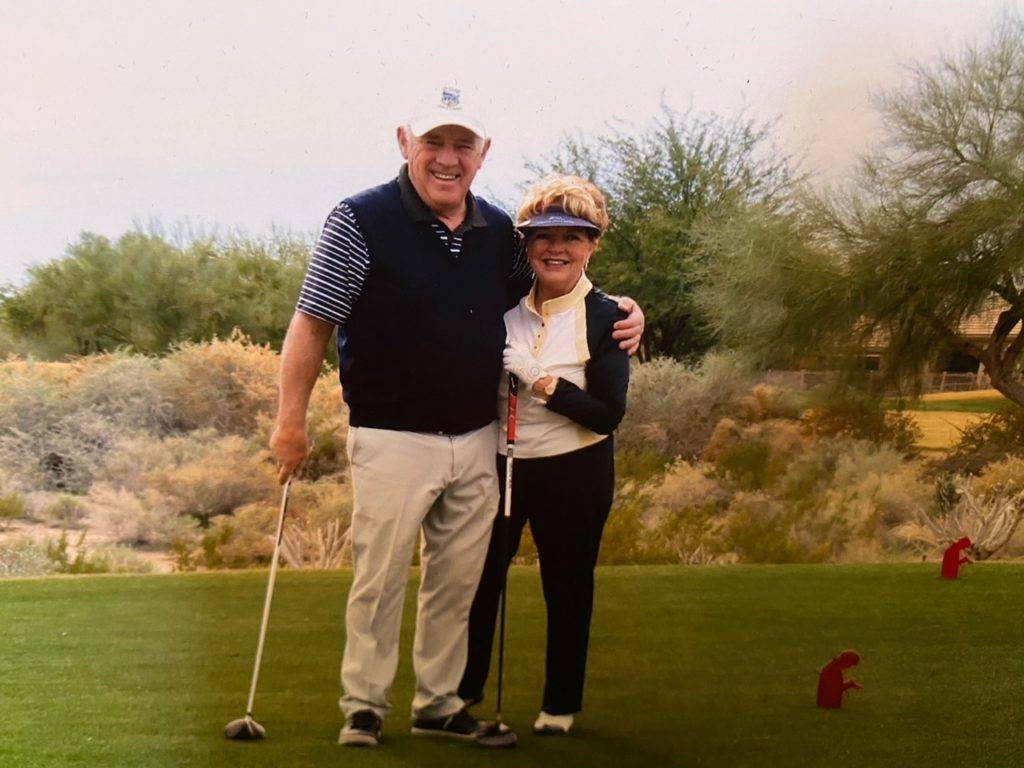 Joe Colello and his wife, Gayle, on the golf course