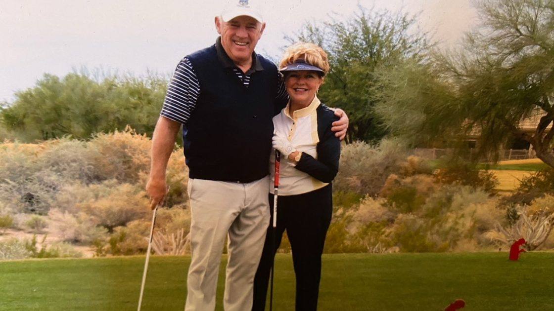 Joe Colello and his wife, Gayle, on the golf course