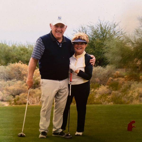 Joe Colello and his wife, Gayle, on the golf course