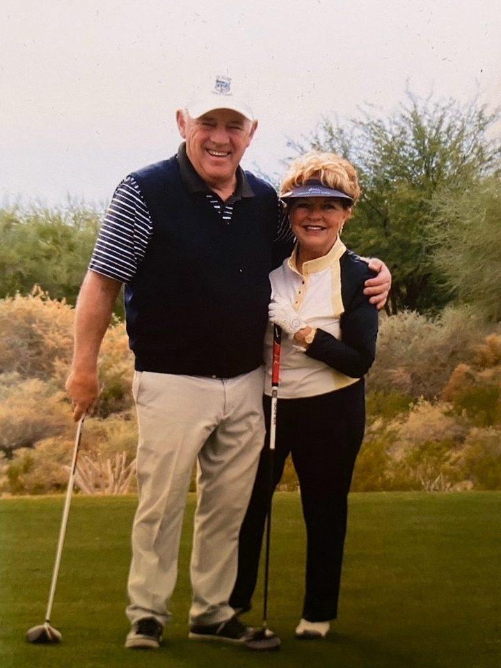 Joe Colello and his wife, Gayle, on the golf course