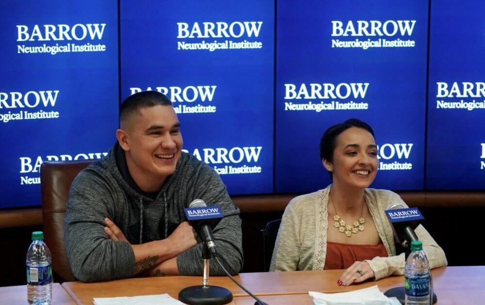 A photo of Barrow patient Jovanna Calzadillas and her husband, Frank, smiling at a press conference