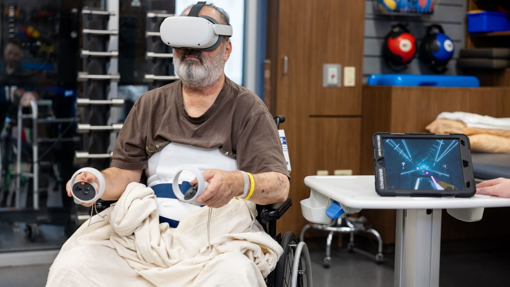 A neuro-rehabilitation patient at Barrow uses the Meta quest augmented reality device.