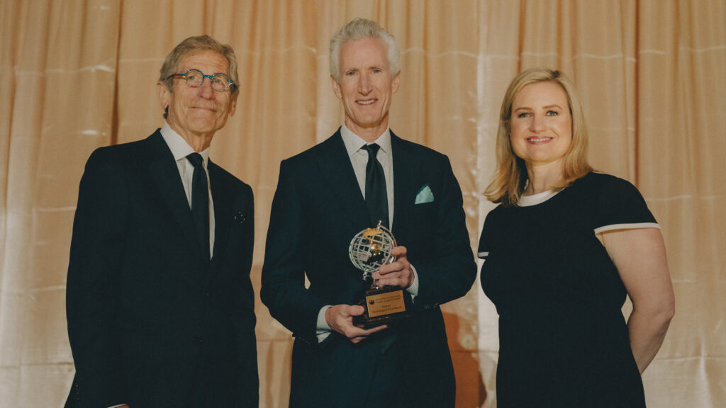 Photo of Dr. Lawton, Dr. Sayare, and Mayor Gallego on stage at Mayor's International.