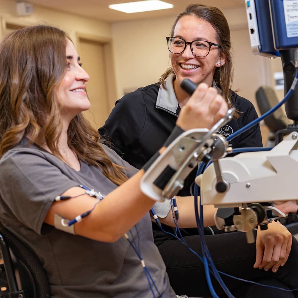 a neuro-rehabilitation patient with a physical therapist