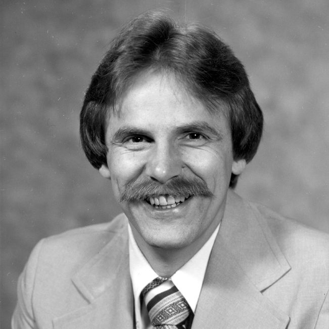 A black and white photo of Dr. Robert Spetzler in the 1980s