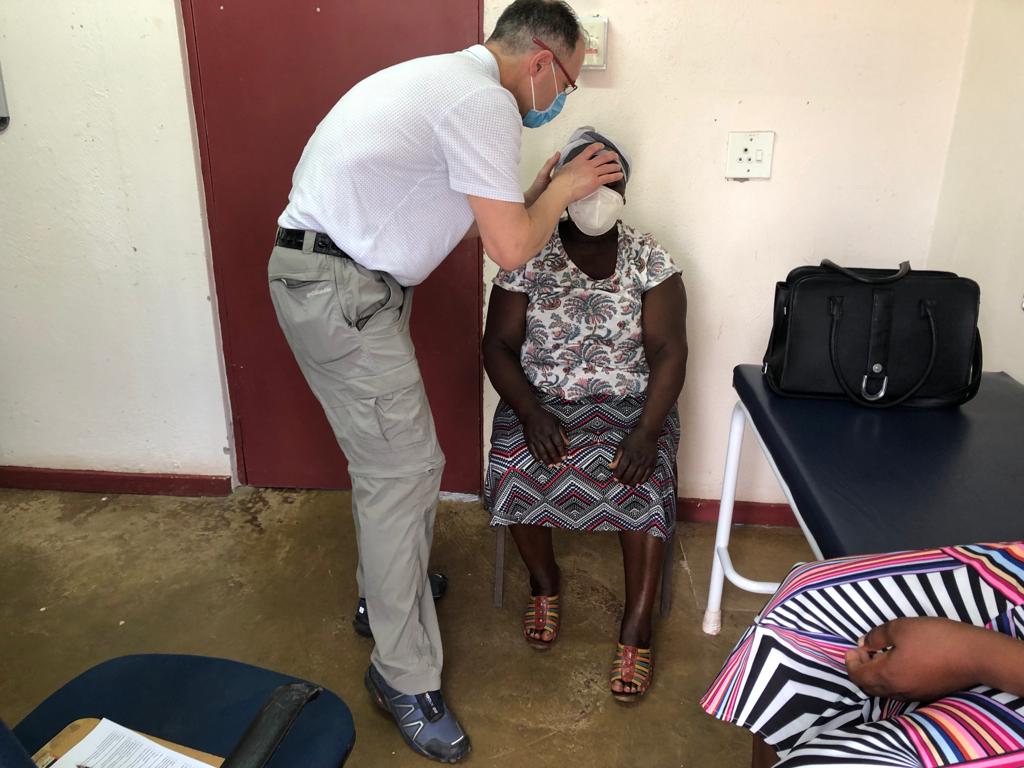 dr. brad racette treats a patient in south africa