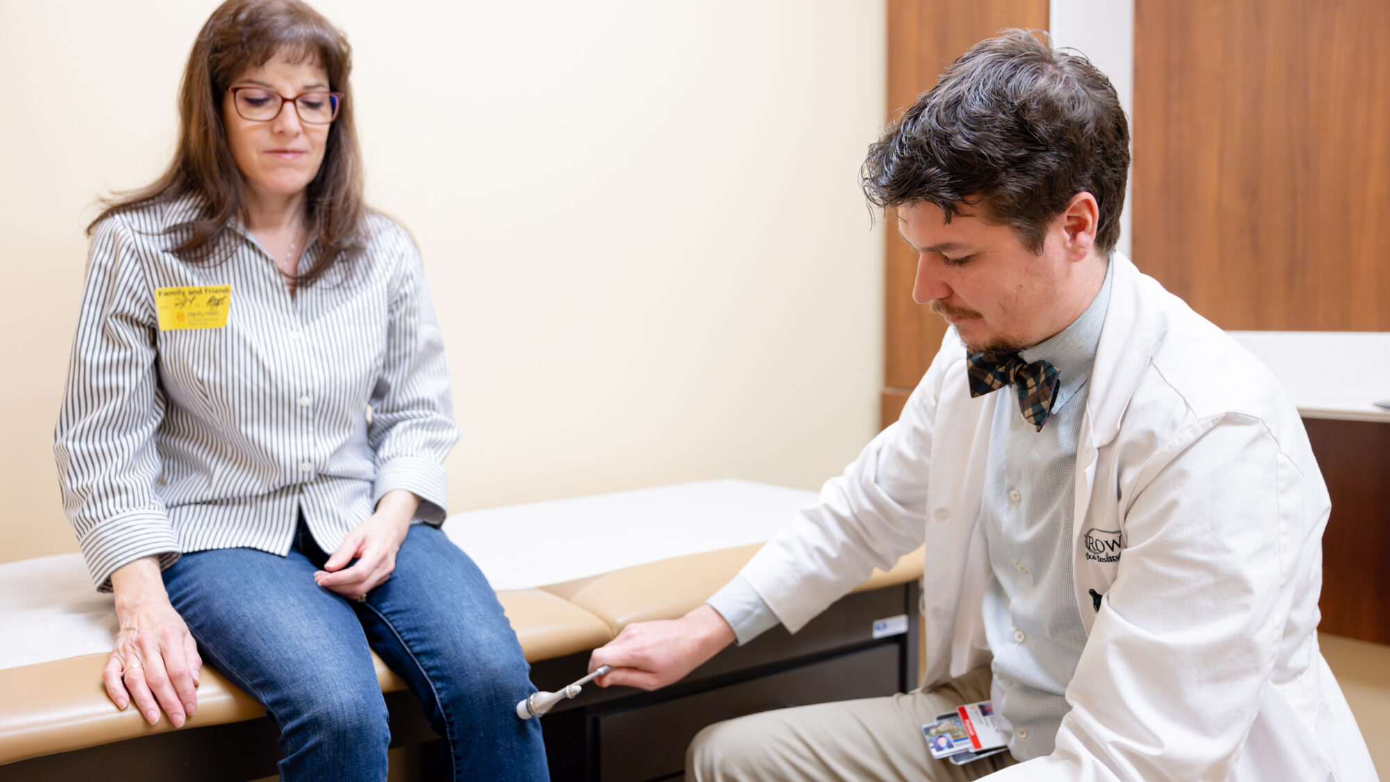 neurologist michael robers performs a neurological exam on a patient at the barrow multiple sclerosis clinic