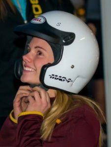 photograph of driving to excel participant brenna bean preparing to head on to the track