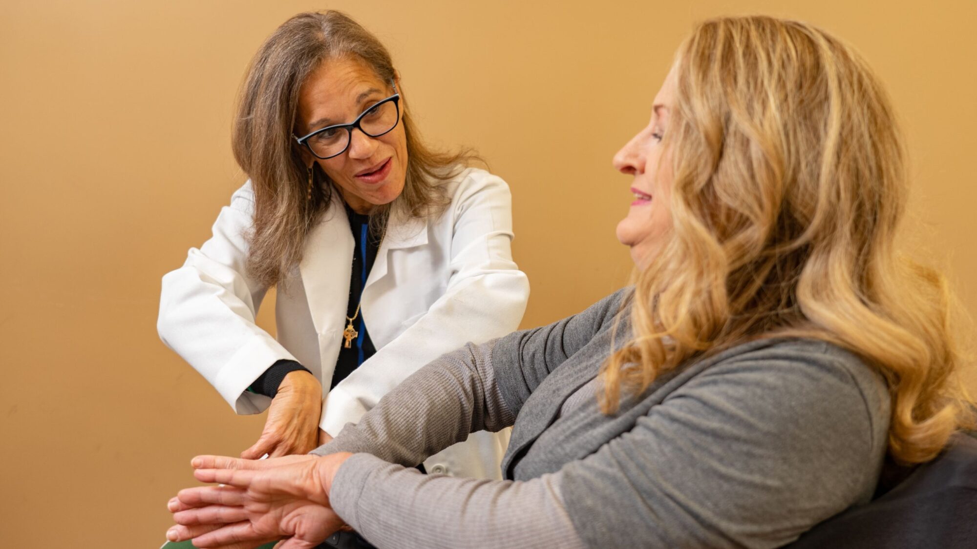 Dr. Candyce Williams with a neuro-rehab patient