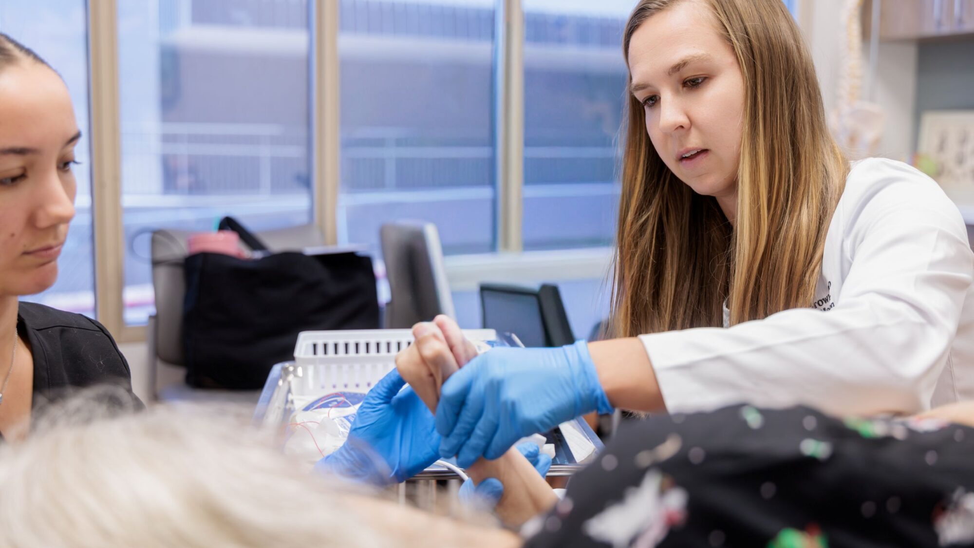 Dr. Casey Brown with a patient