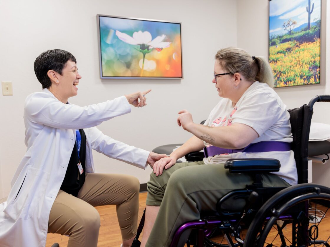 Dr. Christina Kwasnica treating a neuro-rehabilitation patient.