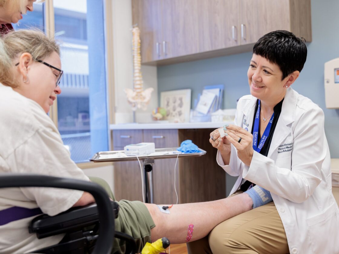 Dr. Christina Kwasnica treating a Neuro-Rehab patient