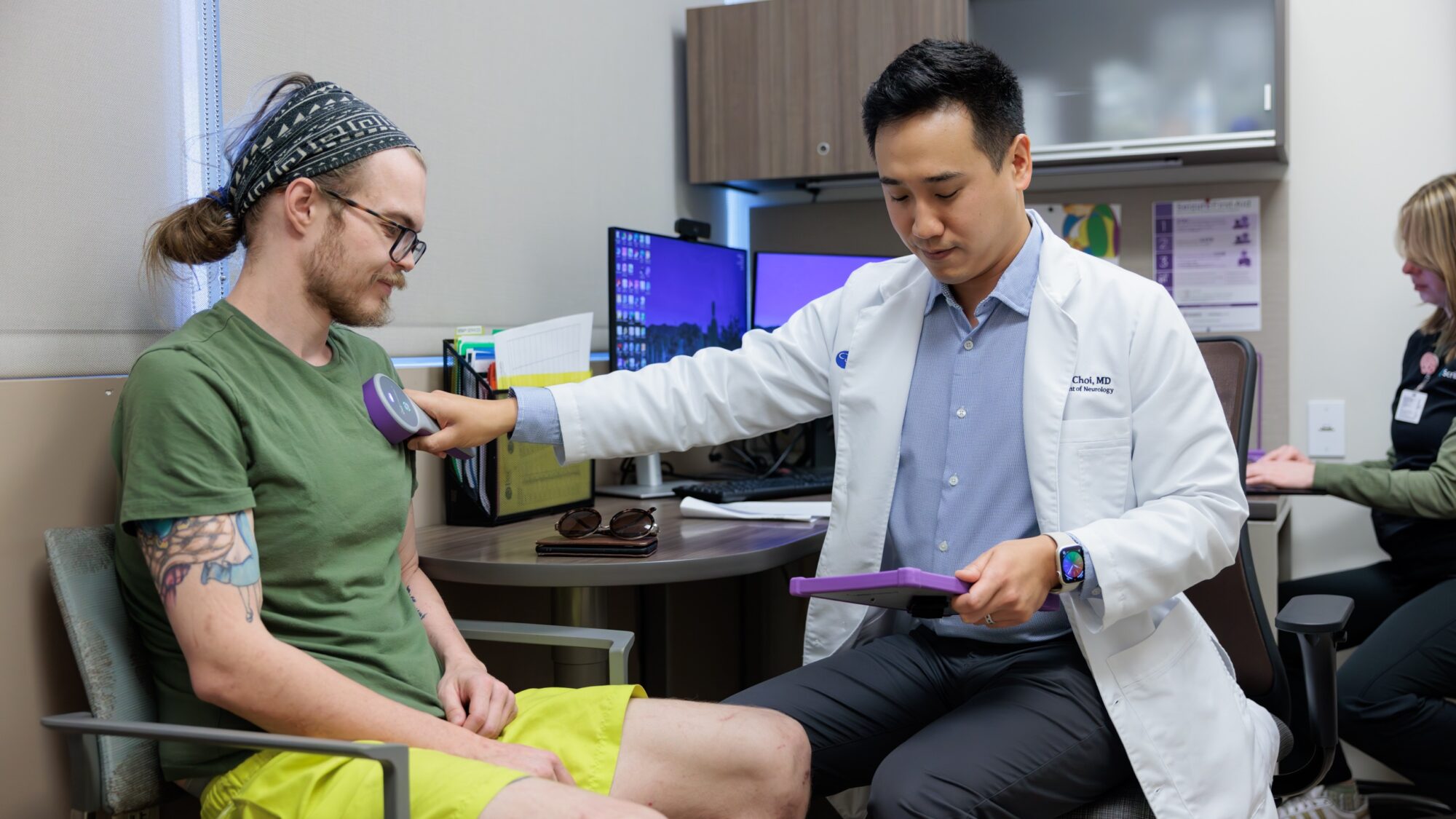 barrow epilepsy specialist kevin choi programs a vagus nerve stimulator in a patient