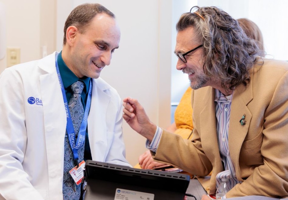 Epilepsy specialist Vladimir Shvarts interacts with a patient in the Barrow Epilepsy Center.