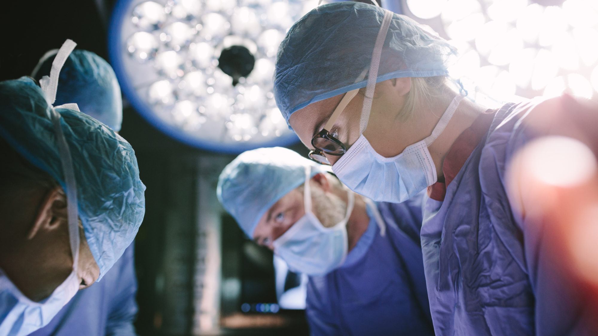 surgeon team performing surgery