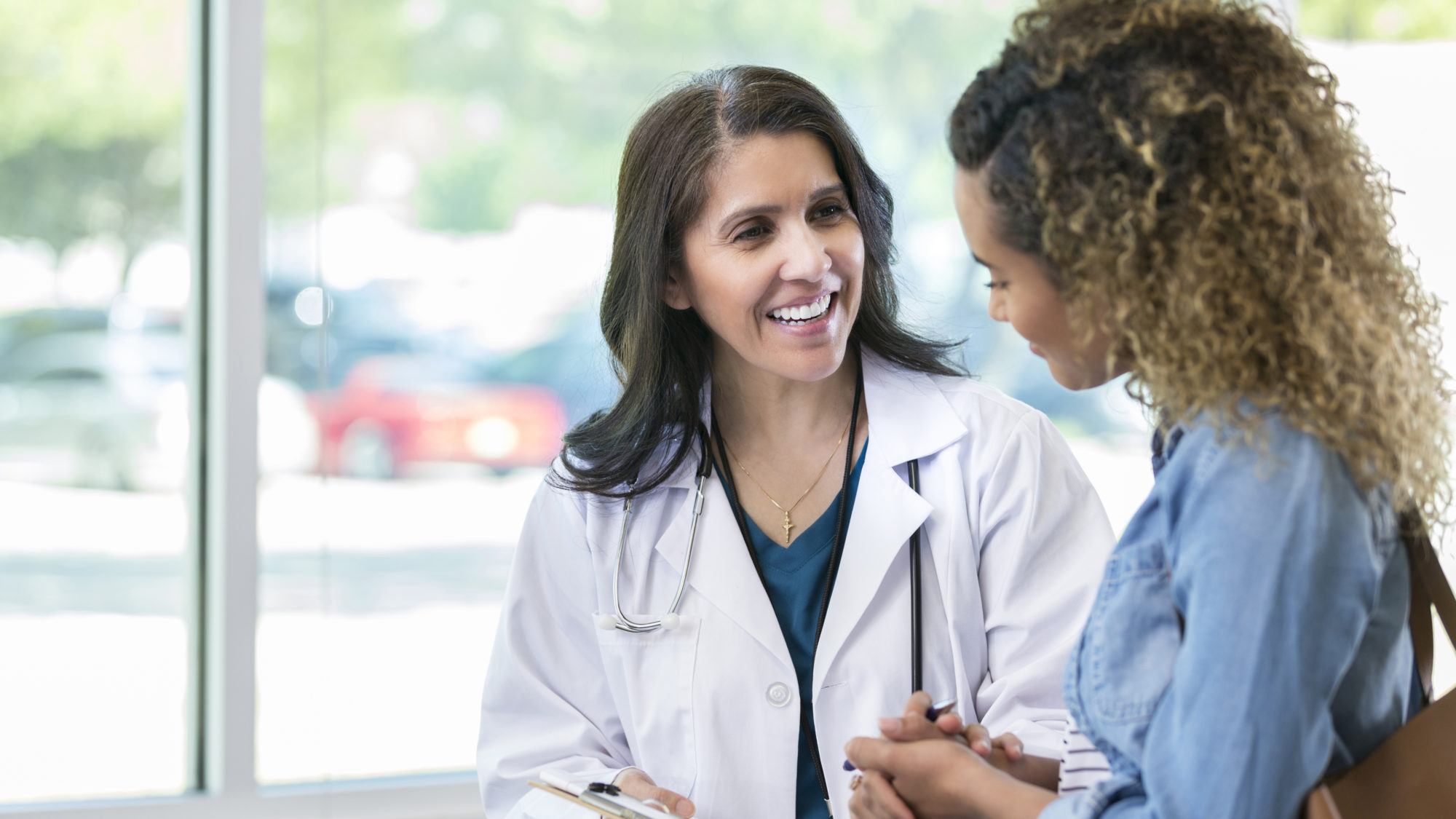 doctor showing results to patient