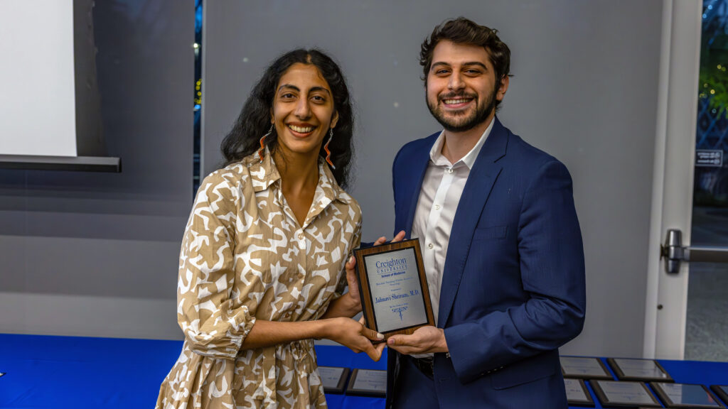 Dr. Jahnavi Shriram is pictured with her plaque at the CUSOM award ceremony. 